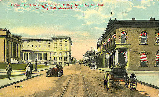 Vintage postcard: Second Street, looking north with Bentley Hotel, Rapides Bank, City Hall and street car tracks